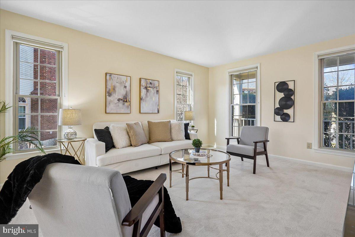8501 Silverview Drive Lorton, VA 22079 - Photo 23 of 72 a living room with furniture and windows