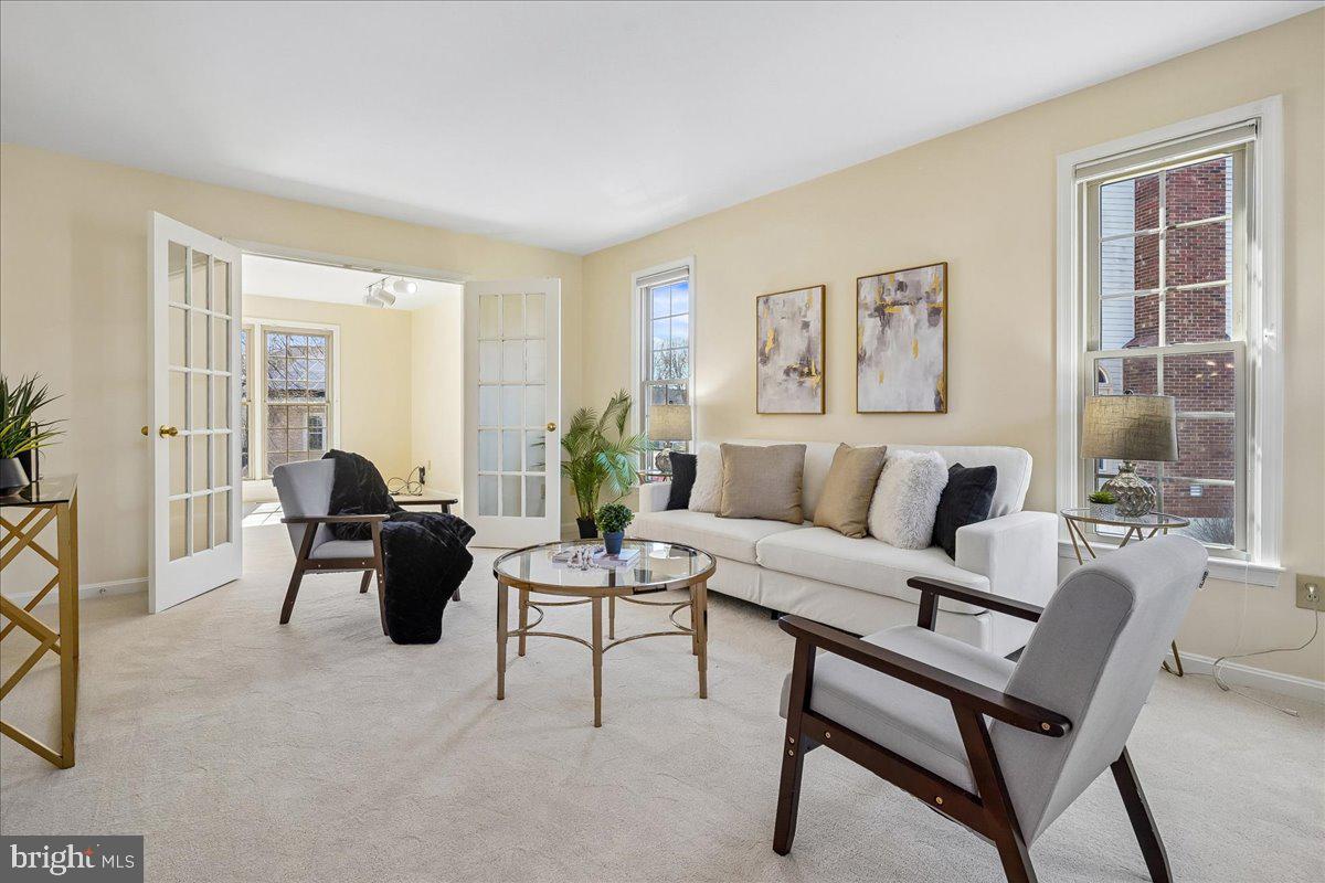 8501 Silverview Drive Lorton, VA 22079 - Photo 24 of 72 a living room with furniture and a potted plant