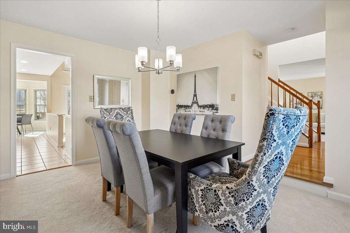 8501 Silverview Drive Lorton, VA 22079 - Photo 28 of 72 a view of a dining room with furniture