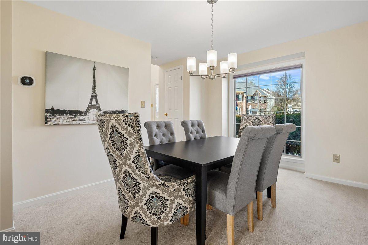 8501 Silverview Drive Lorton, VA 22079 - Photo 30 of 72 a view of a dining room with furniture window and outside view