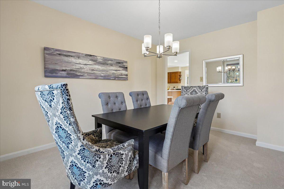 8501 Silverview Drive Lorton, VA 22079 - Photo 31 of 72 a view of a dining room with furniture