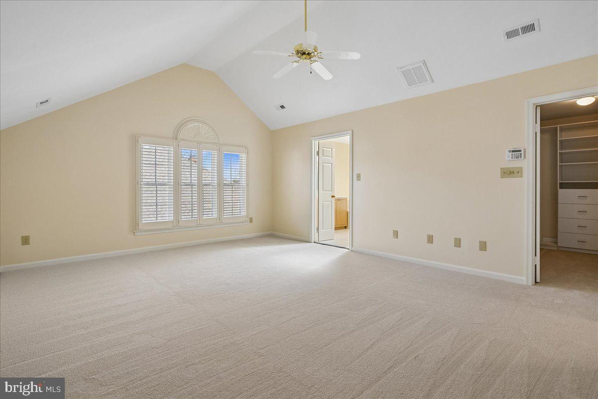 8501 Silverview Drive Lorton, VA 22079 - Photo 38 of 72 an empty room with windows and ceiling fan