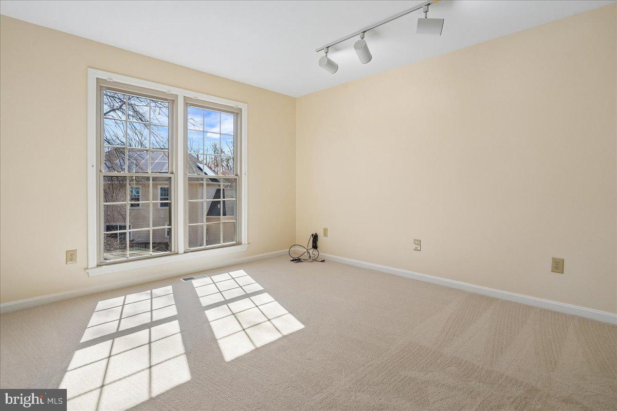 8501 Silverview Drive Lorton, VA 22079 - Photo 45 of 72 a view of an empty room with windows