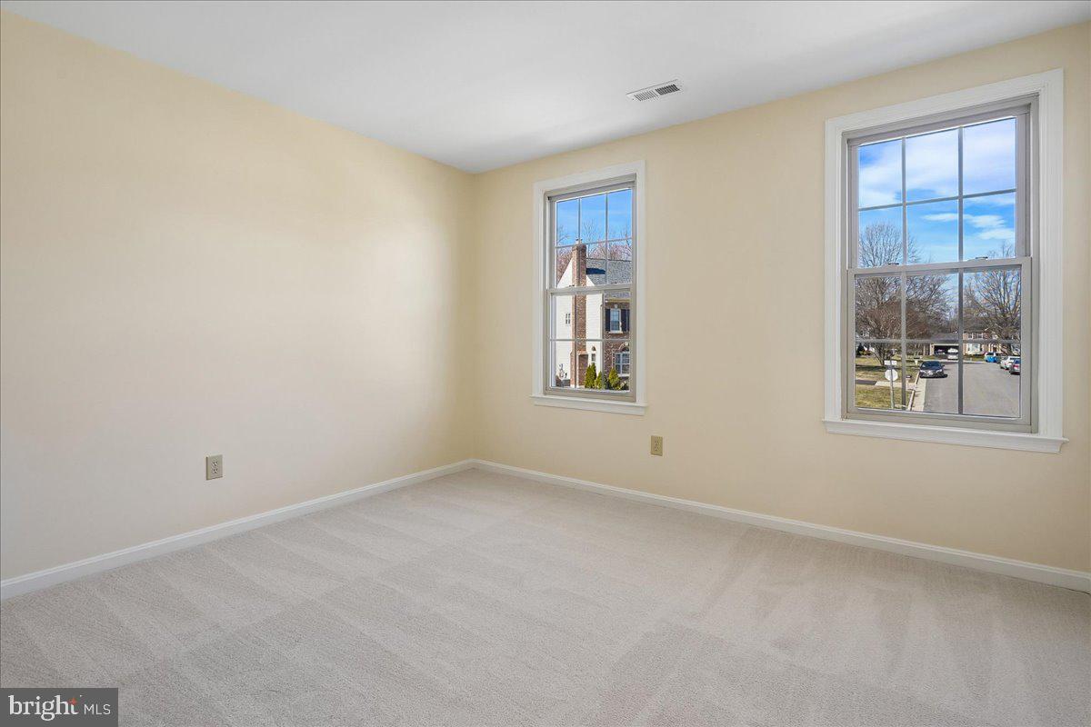 8501 Silverview Drive Lorton, VA 22079 - Photo 48 of 72 an empty room with windows