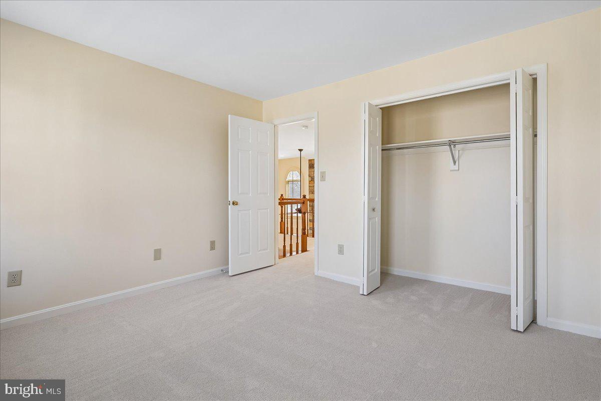 8501 Silverview Drive Lorton, VA 22079 - Photo 49 of 72 an empty room with closet and a window