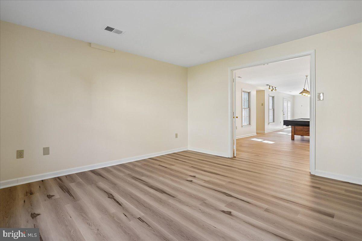 8501 Silverview Drive Lorton, VA 22079 - Photo 55 of 72 a view of empty room with wooden floor