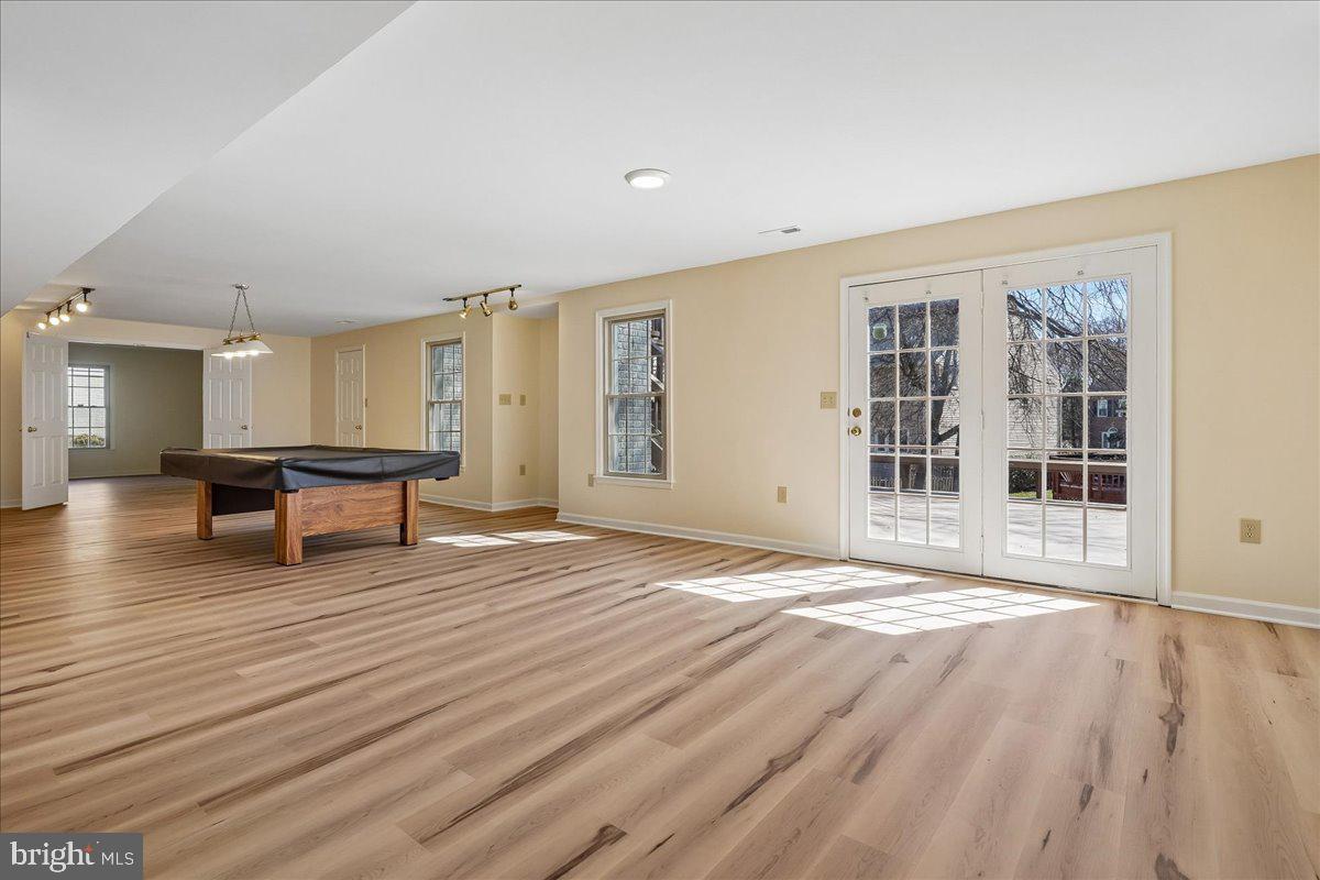 8501 Silverview Drive Lorton, VA 22079 - Photo 59 of 72 a view of an empty room with wooden floor and a window