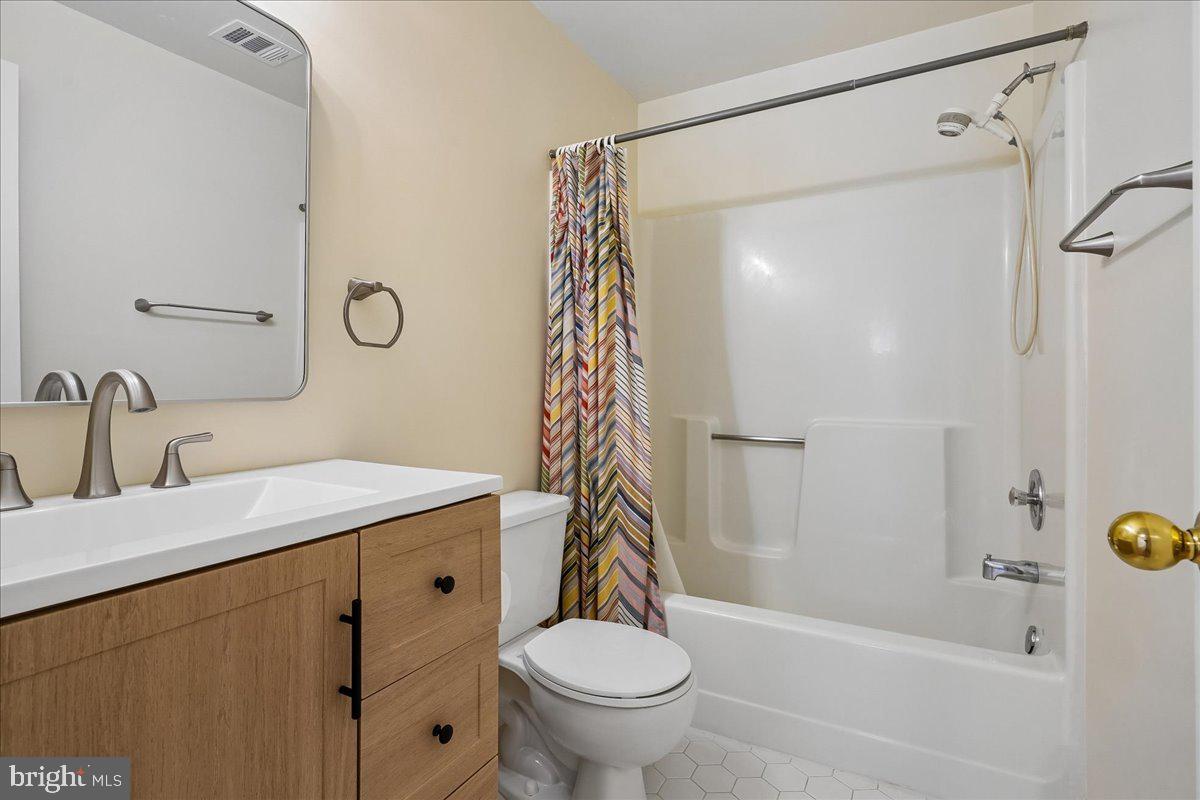 8501 Silverview Drive Lorton, VA 22079 - Photo 62 of 72 a bathroom with a sink a toilet and shower
