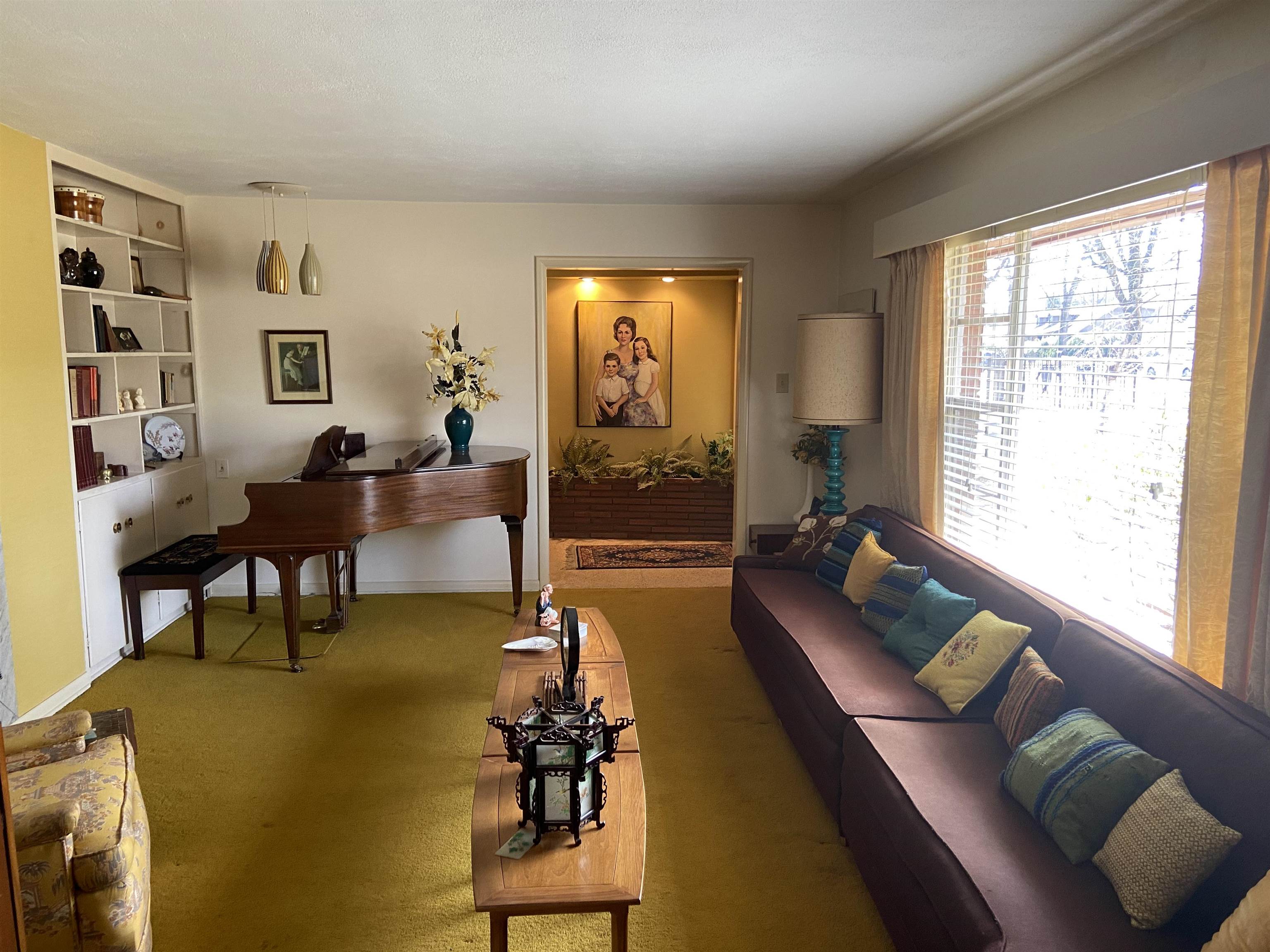 5410 Walnut Grove Road Memphis, TN 38120 - Photo 2 of 16 a living room with furniture and a window