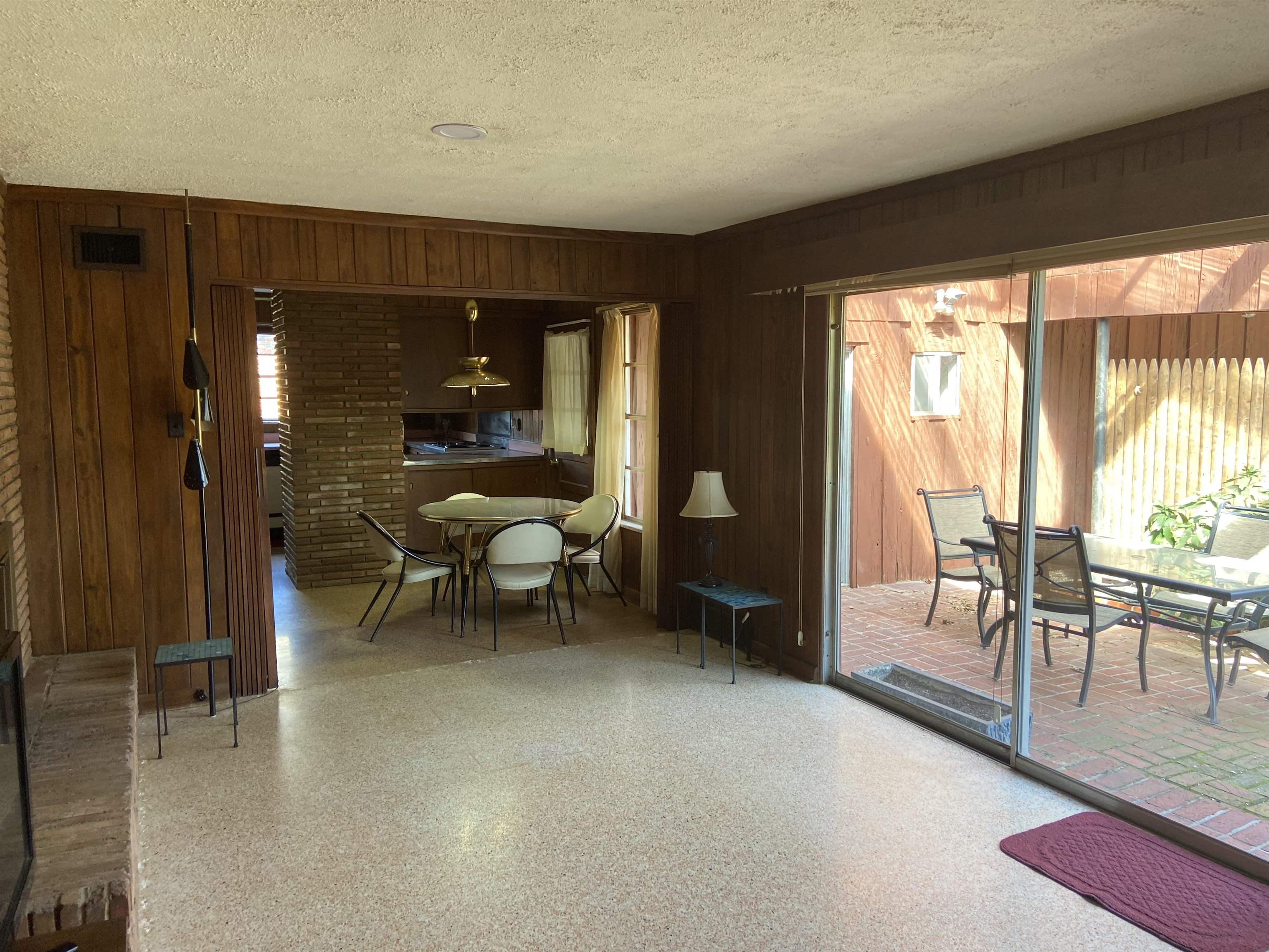 5410 Walnut Grove Road Memphis, TN 38120 - Photo 4 of 16 a living room with furniture and a floor to ceiling window