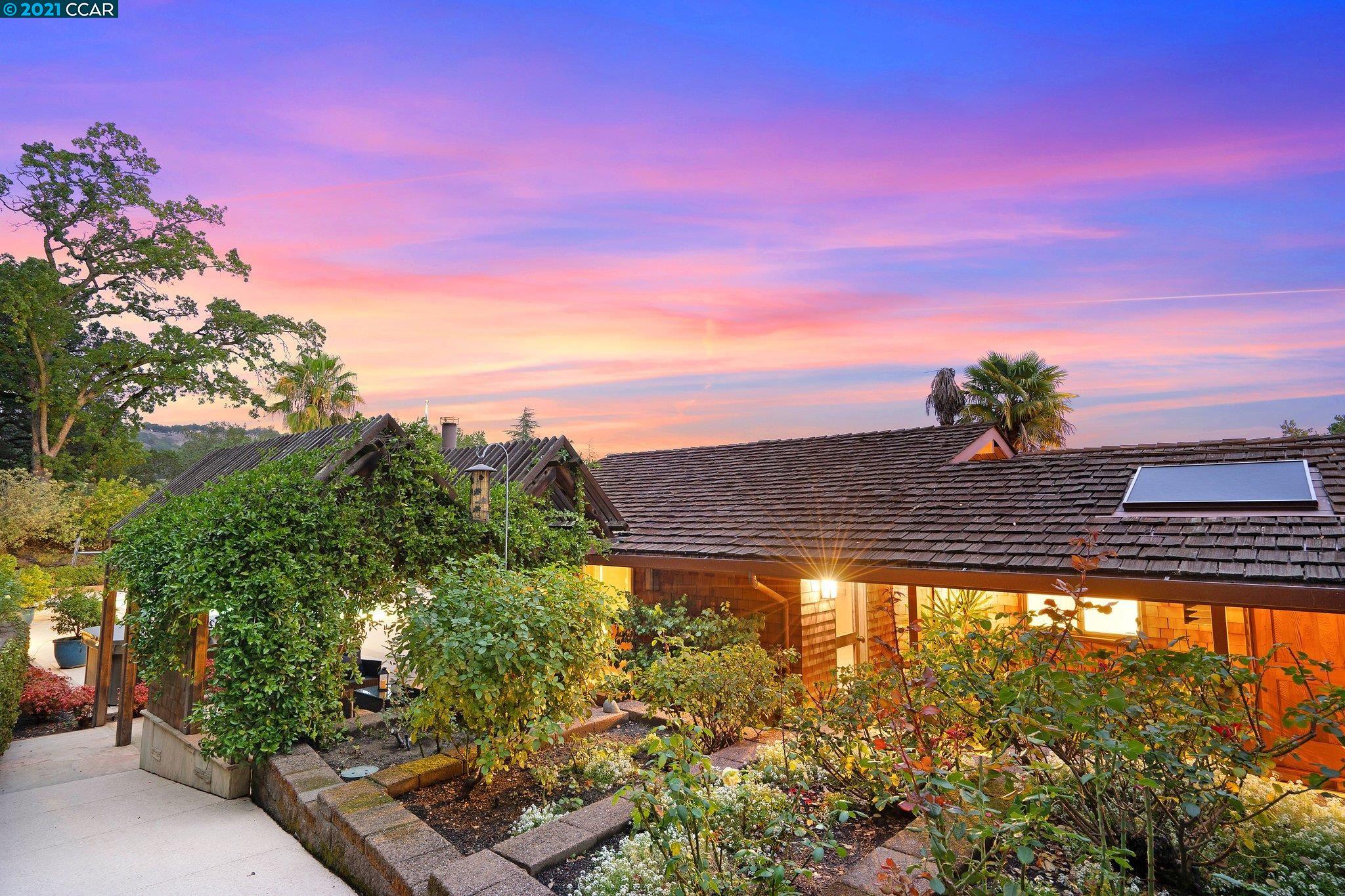 55 Cricket Hill Road Lafayette, CA 94549 - Photo 1 of 1 a view of a swimming pool with a yard