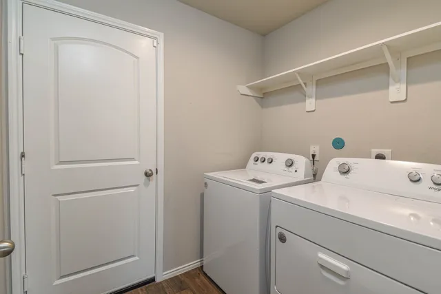 a view of storage room with washer and dryer