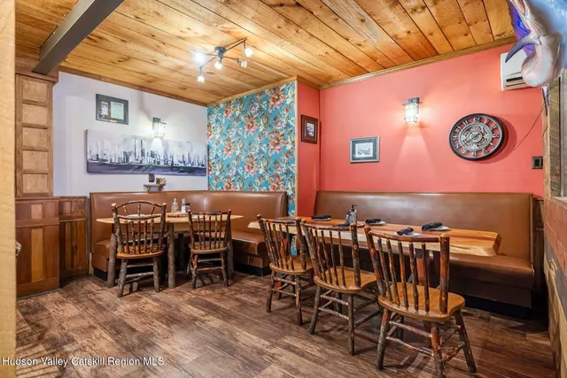 a view of a brick building with many windows