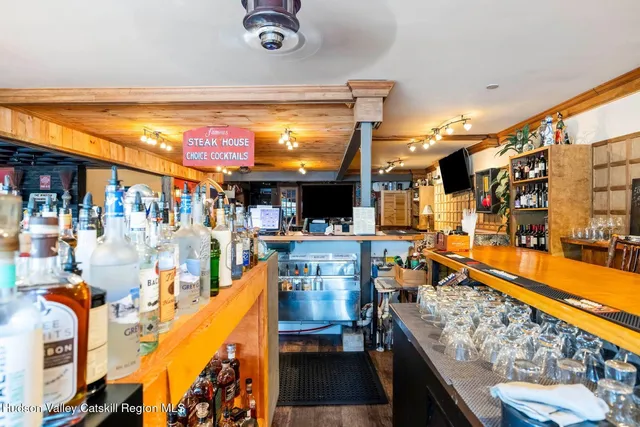 a kitchen with a stove and a cabinets