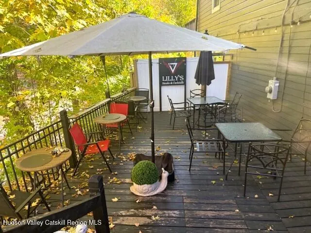 a front view of a building with small garden