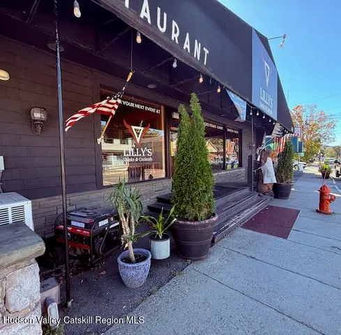 a view of a building with sitting area