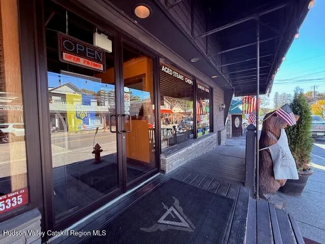 a view of a chairs and tables in patio