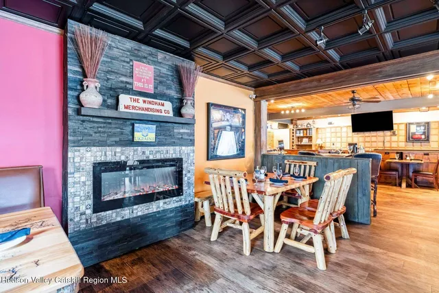 a outdoor space with lots of chairs and appliances