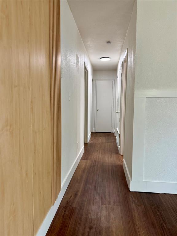1114 Blackburn Street Commerce, TX 75428 - Photo 4 of 20 a view of hallway with wooden floor
