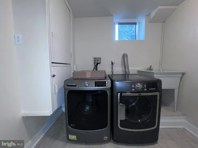 a kitchen with a stove and a sink