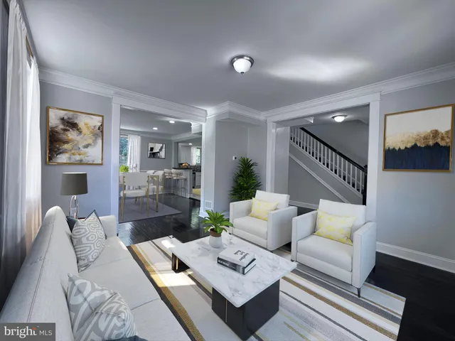 a living room with furniture and a table