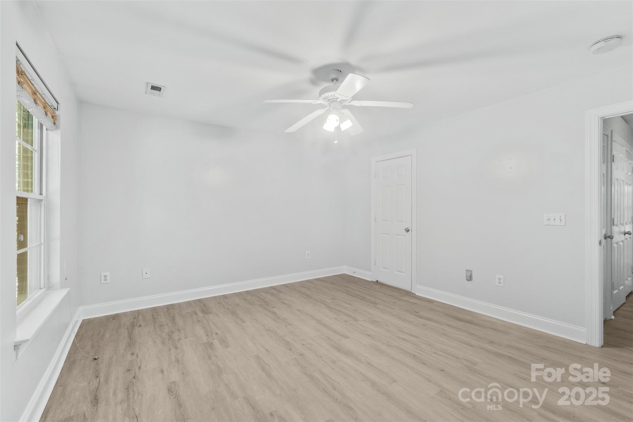 2476 Ryerson Court Charlotte, NC 28213 - Photo 25 of 30 wooden floor in an empty room