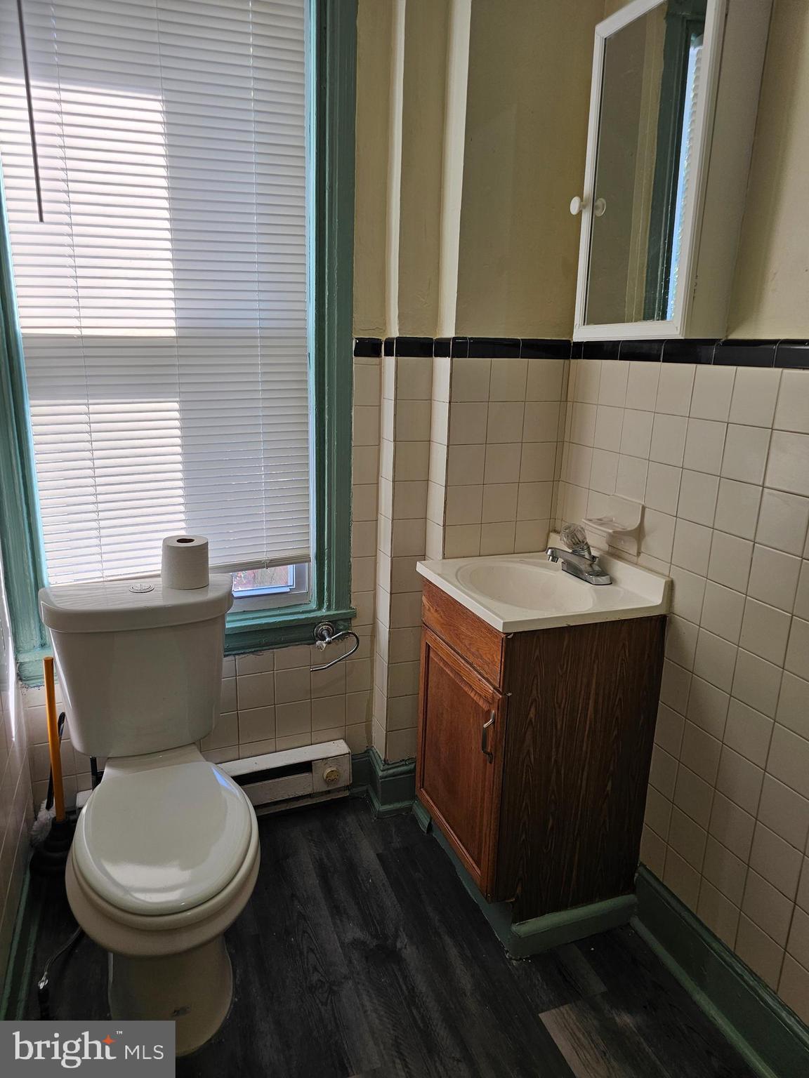 5515 North Fairhill Street Philadelphia, PA 19120 - Photo 10 of 12 a bathroom with a sink and a toilet