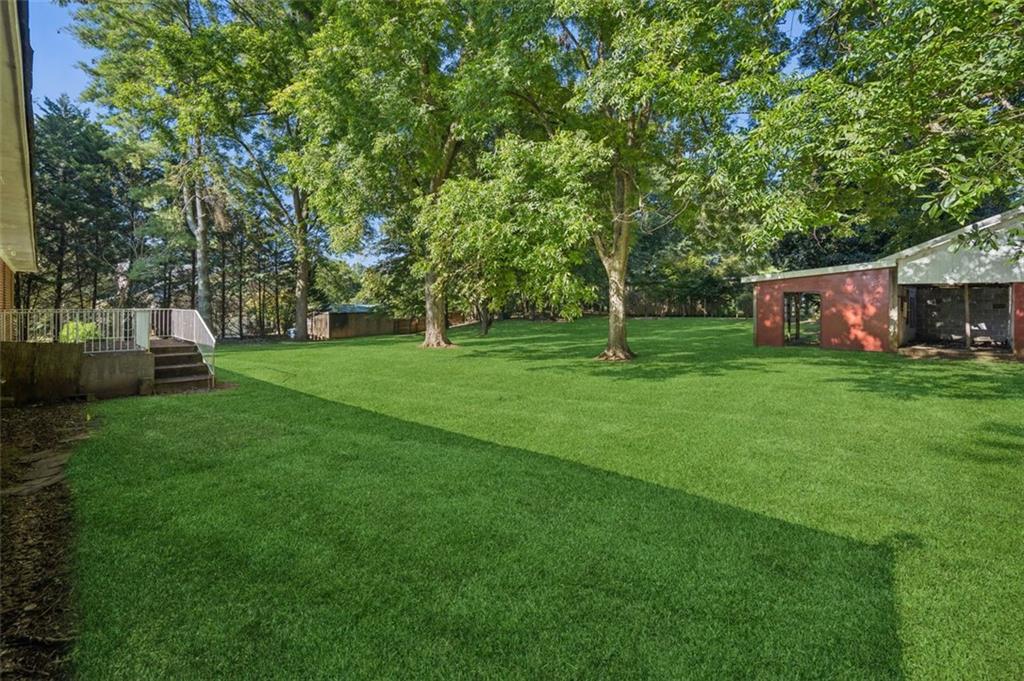13890 Cowart Road Alpharetta, GA 30004 - Photo 11 of 33 a view of a park with large trees