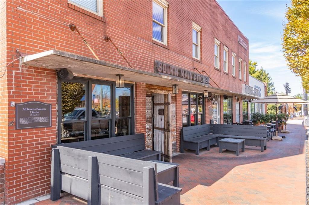 13890 Cowart Road Alpharetta, GA 30004 - Photo 22 of 33 a view of a building with sitting area