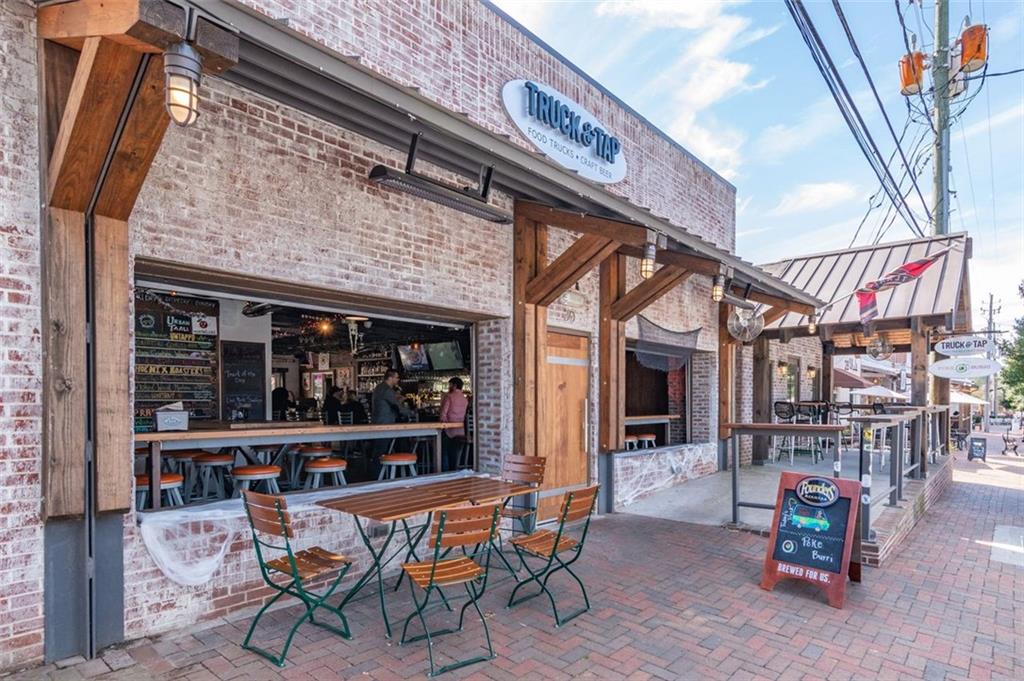 13890 Cowart Road Alpharetta, GA 30004 - Photo 26 of 33 a view of a chairs and table in the patio