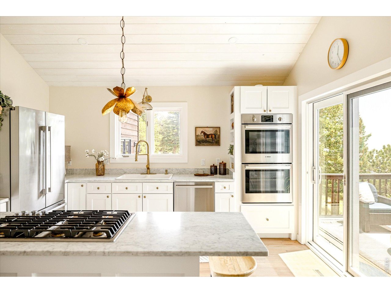 Newly Remodeled Kitchen with Marble Countertops and Solid Wood Custom Cabinetry