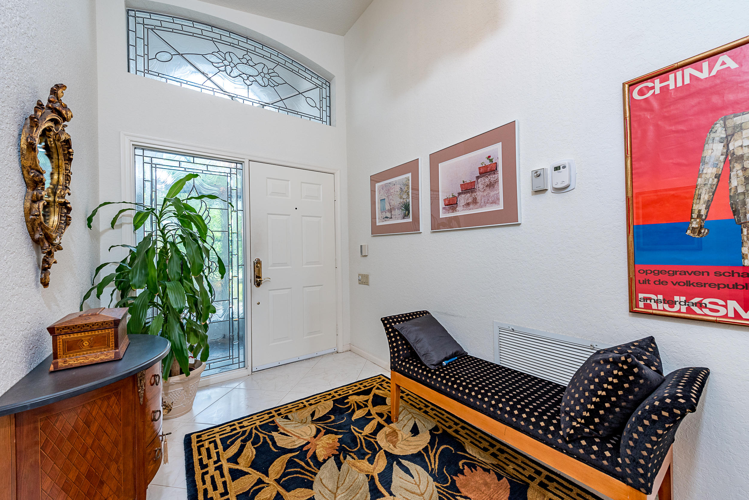 Foyer with etched glass windows