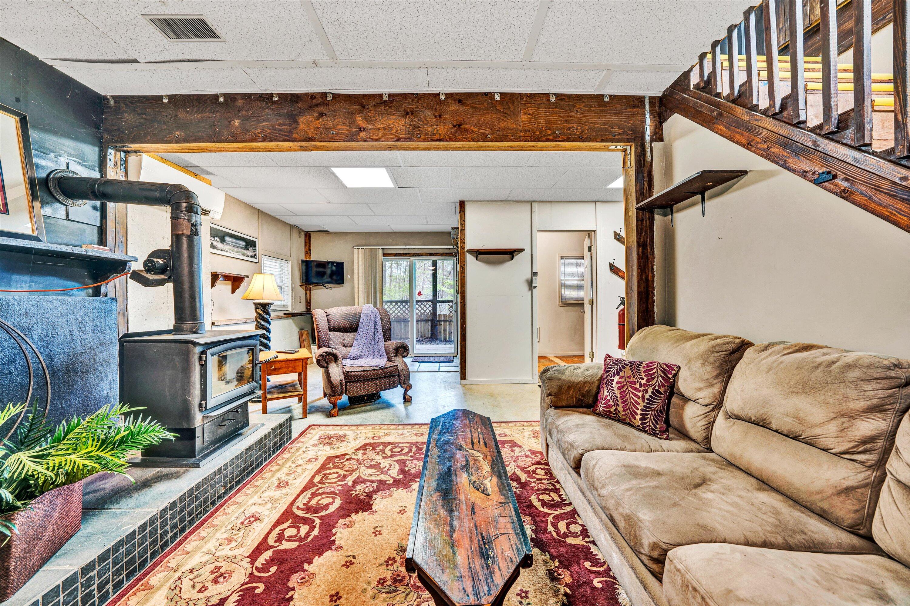 980 Power Dam Road Rocky Mount, VA 24151 - Photo 37 of 55 a living room with furniture and a rug