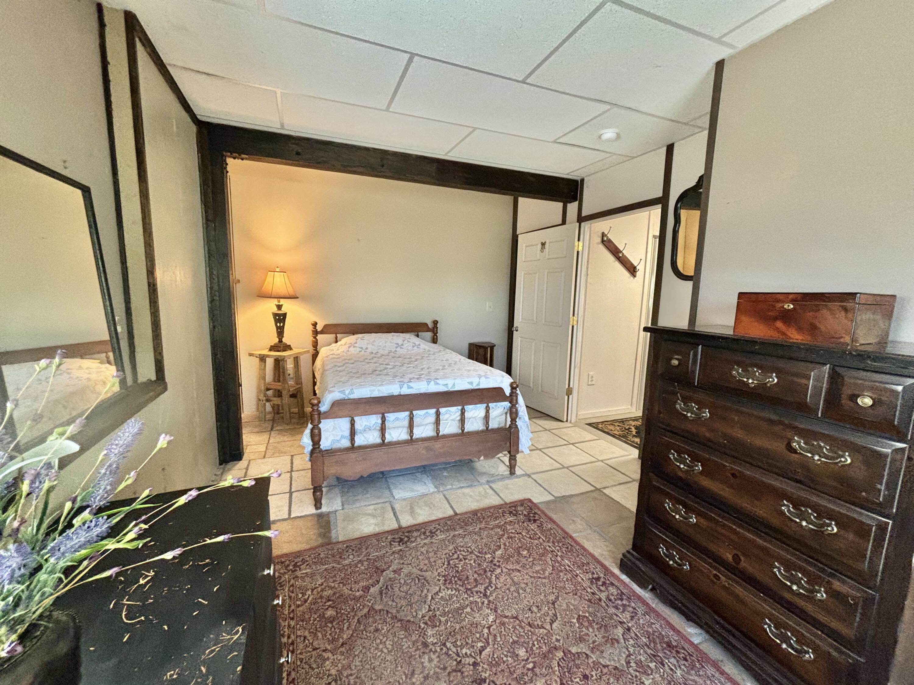 980 Power Dam Road Rocky Mount, VA 24151 - Photo 43 of 55 a bedroom with a bed window and a mirror
