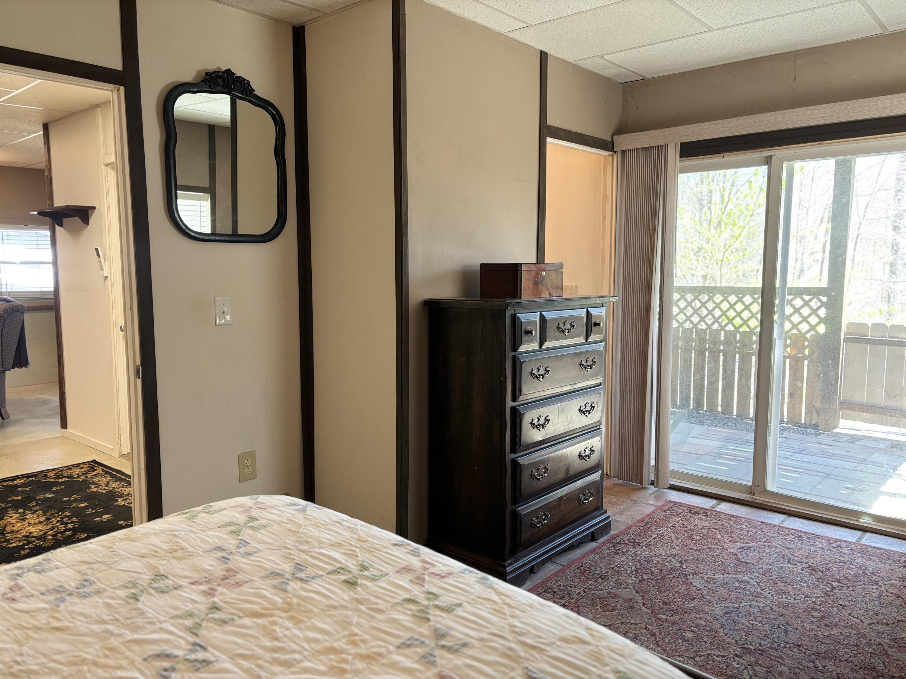 980 Power Dam Road Rocky Mount, VA 24151 - Photo 45 of 55 a view of bedroom with a large window and mirror
