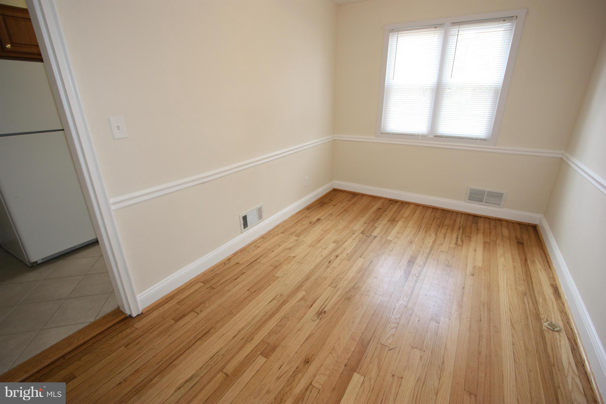 1018 Wedgewood Road Baltimore, MD 21229 - Photo 12 of 30 DINING ROOM ... TRIMMED OUT WITH CHAIR RAIL