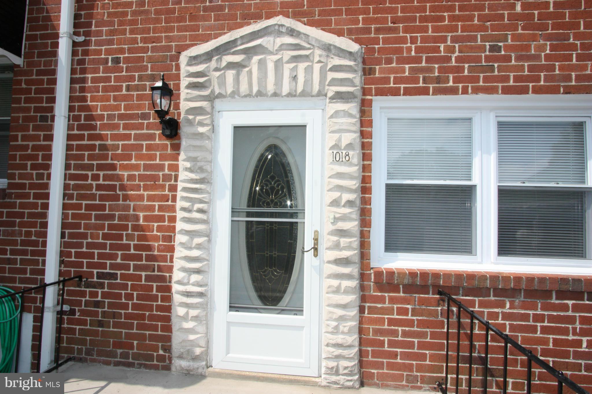 1018 Wedgewood Road Baltimore, MD 21229 - Photo 5 of 30 STORM DOORS ON THE FRONT AND THE BACK