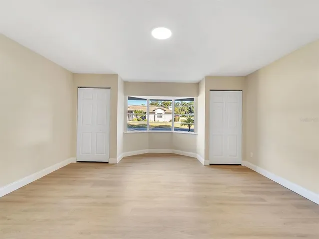 an empty room with windows