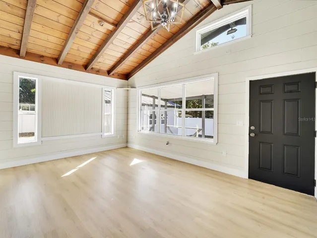 en empty room with windows