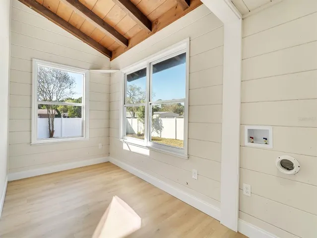 a view of an empty room and window