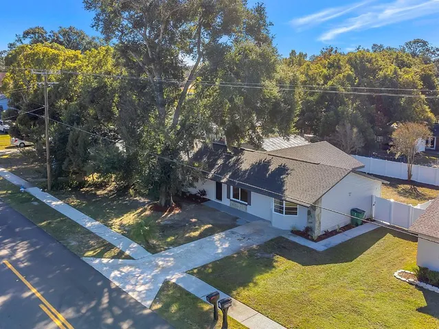 swimming pool view with a seating space