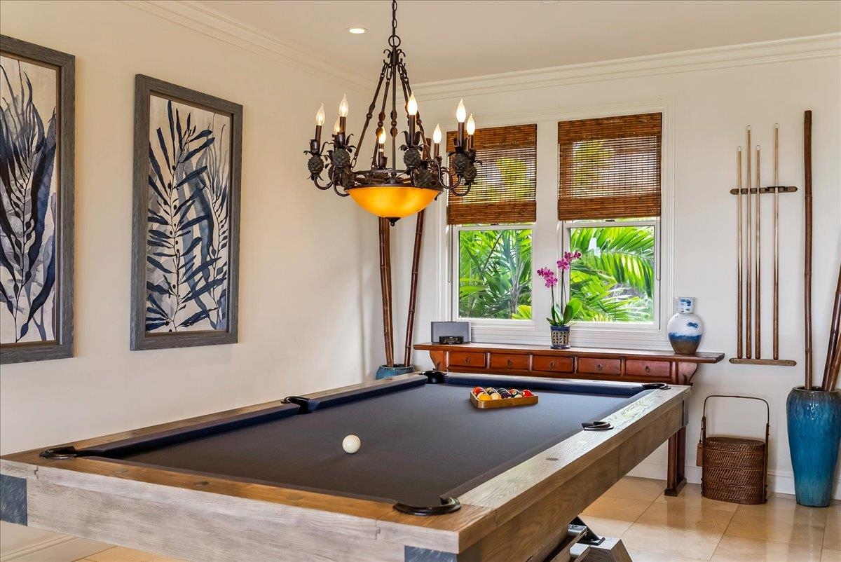 21 Kiloa Street, Unit 4 Kihei, HI 96753 - Photo 15 of 50 a room with pool table and windows