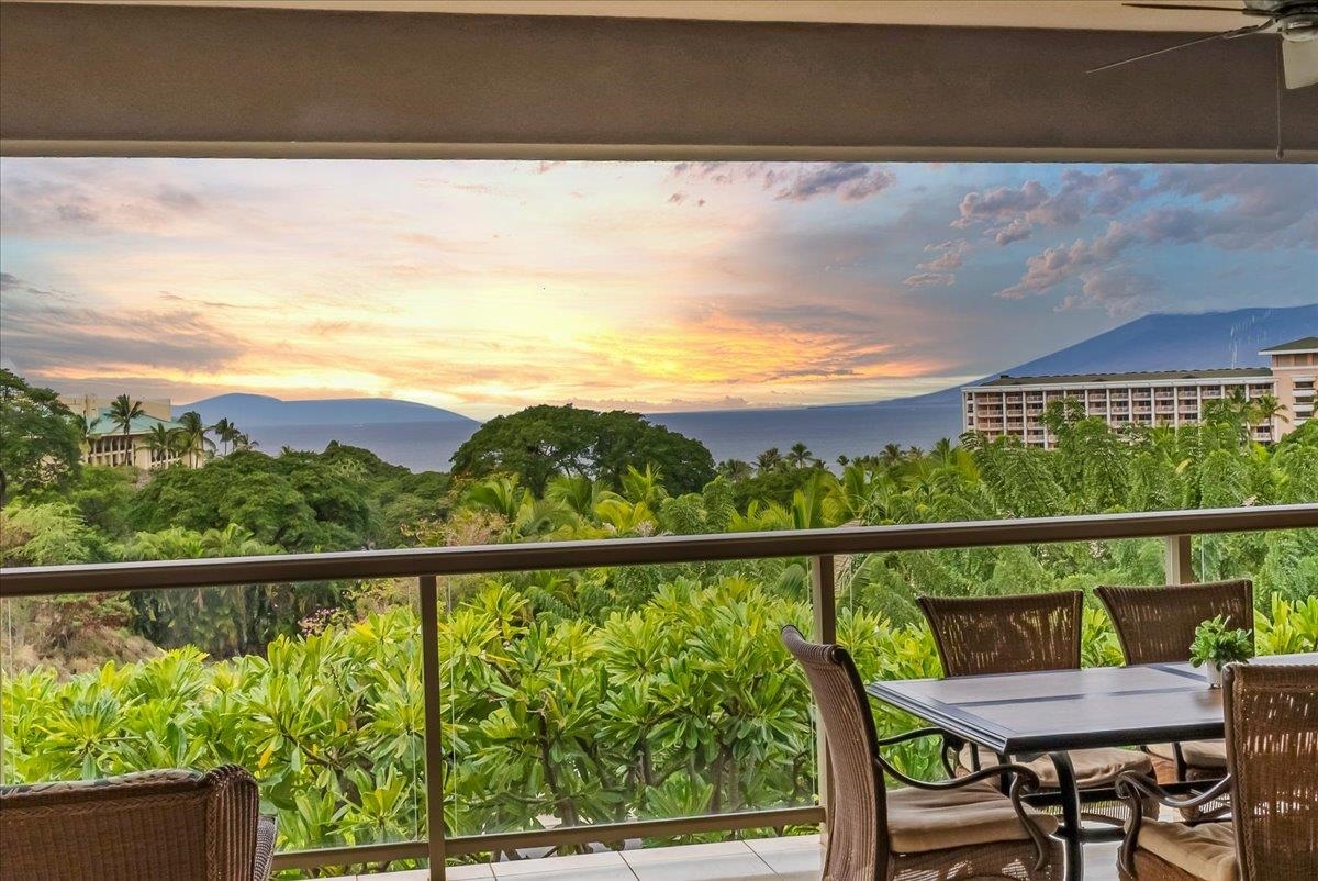 21 Kiloa Street, Unit 4 Kihei, HI 96753 - Photo 20 of 50 a view of a chairs and table in the balcony