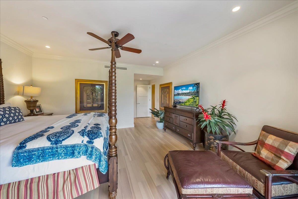 21 Kiloa Street, Unit 4 Kihei, HI 96753 - Photo 28 of 50 a living room with furniture and a flat screen tv