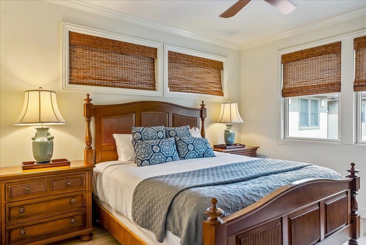 21 Kiloa Street, Unit 4 Kihei, HI 96753 - Photo 36 of 50 a bedroom with a bed and window