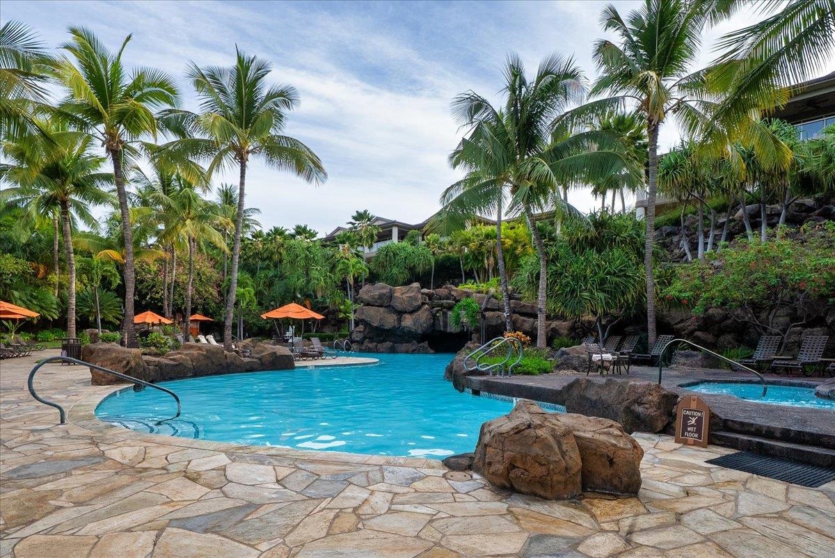 21 Kiloa Street, Unit 4 Kihei, HI 96753 - Photo 47 of 50 a view of a backyard with swimming pool and furniture