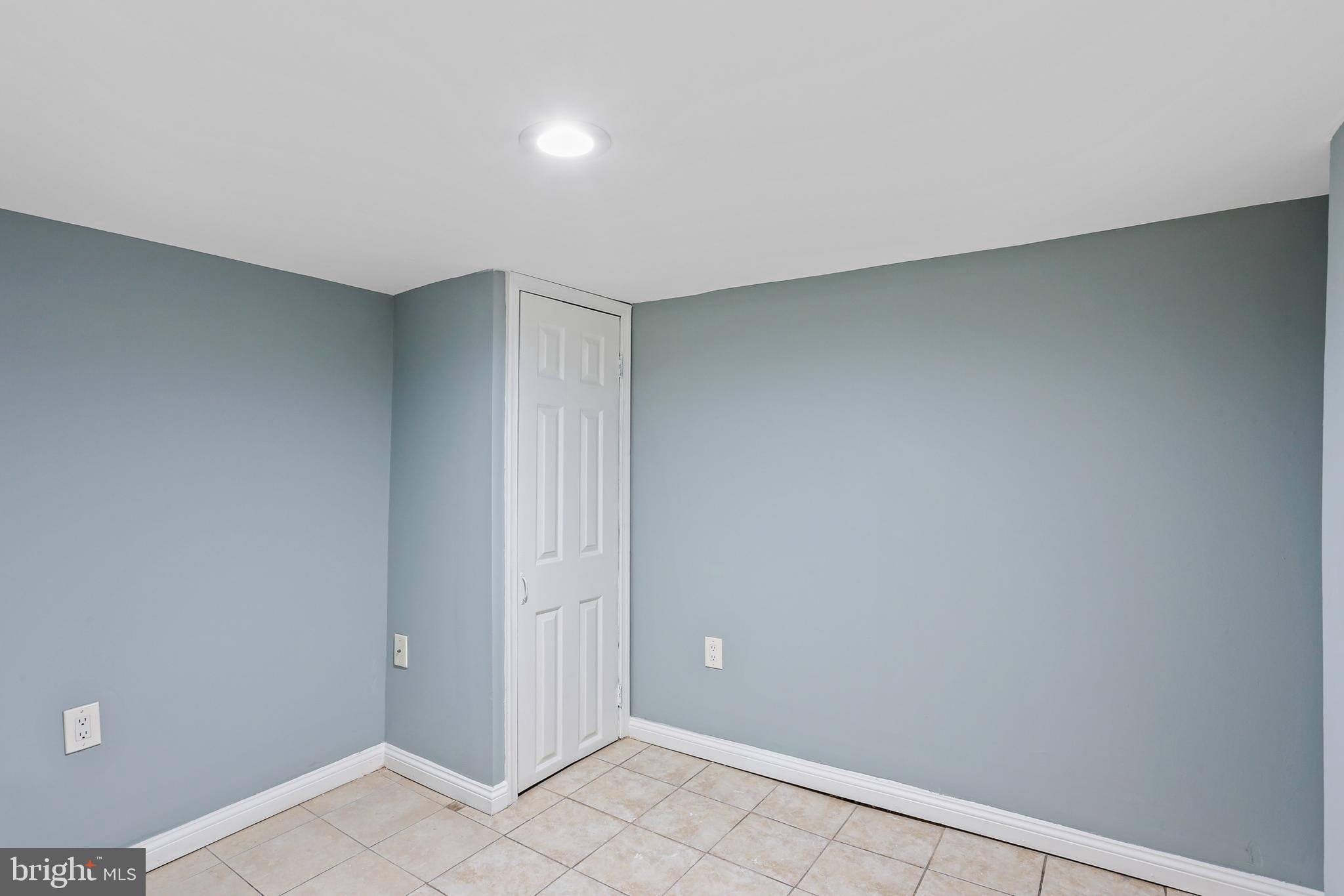 6812 Harford Road Baltimore, MD 21234 - Photo 23 of 33 Lower Level Bedroom 1 with Tile Flooring