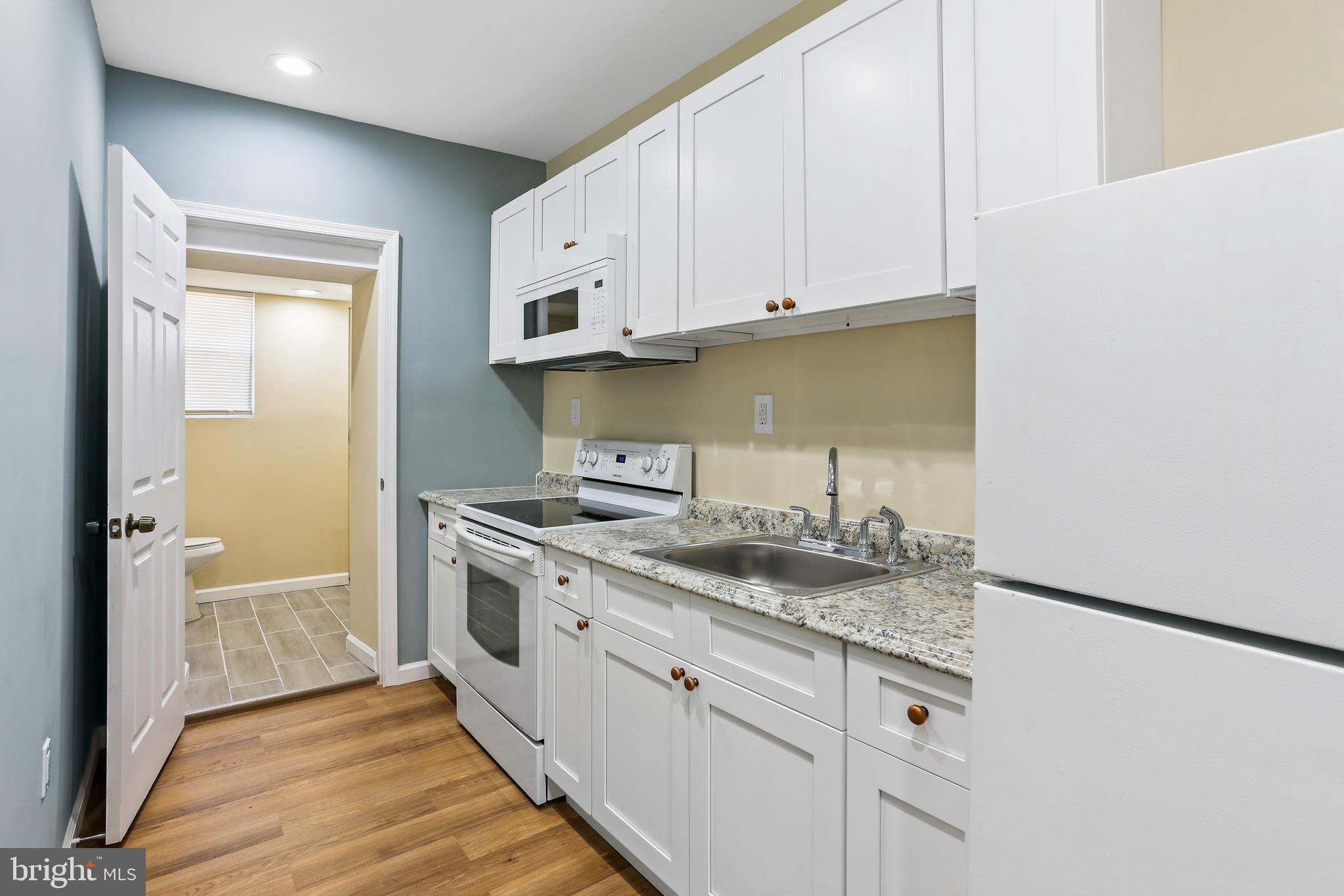 6812 Harford Road Baltimore, MD 21234 - Photo 3 of 33 Gorgeous Galley Kitchen w/new Shaker Cabinets