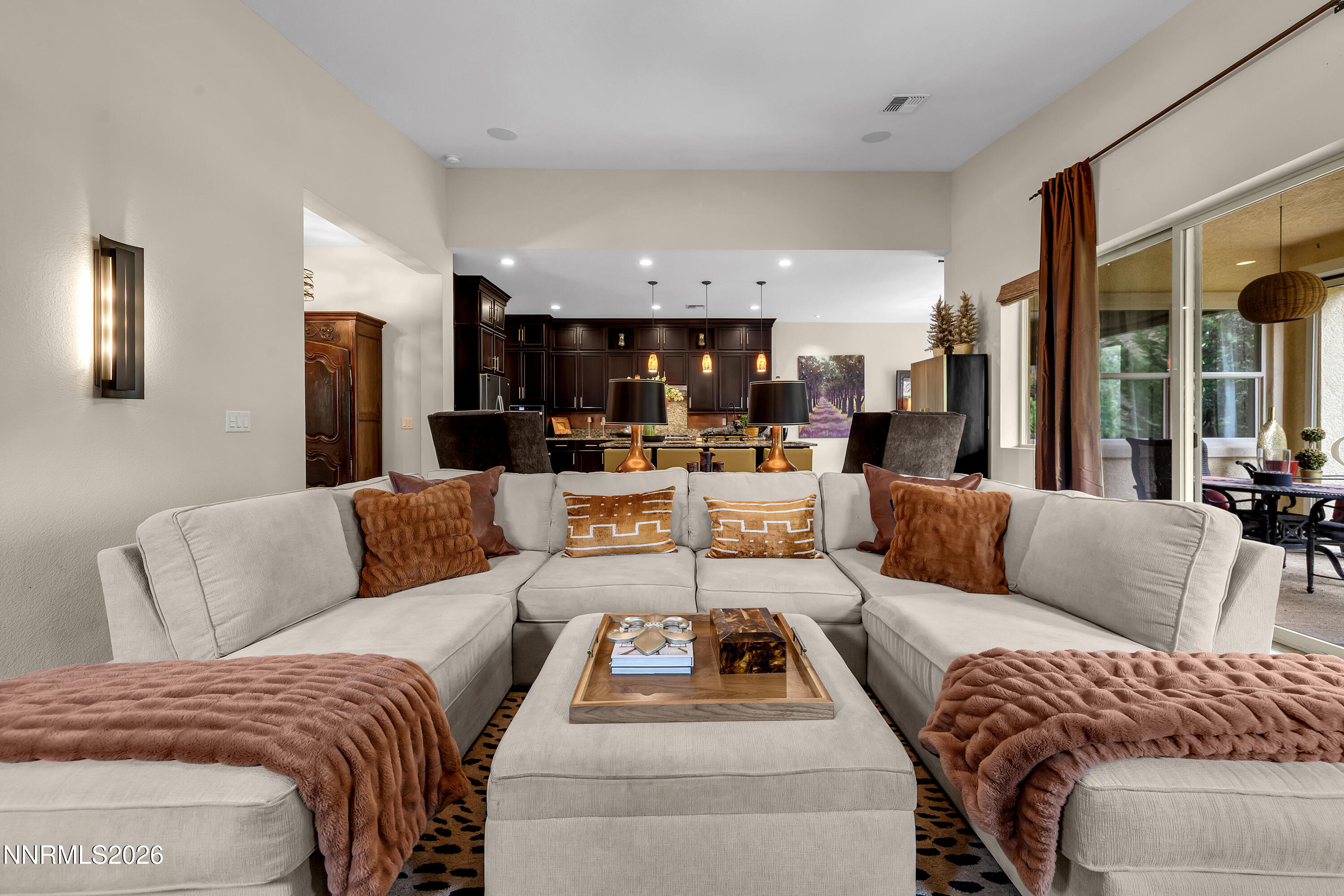 9021 Iron Sky Court Reno, NV 89523 - Photo 3 of 39 a living room with furniture and a view of kitchen
