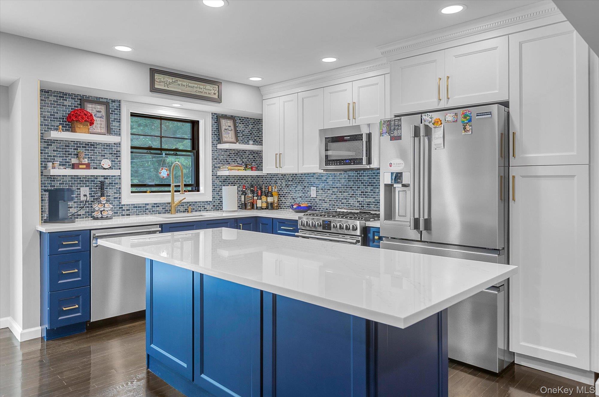 31 Apple Lane Commack, NY 11725 - Photo 8 of 28 Kitchen island provides additional counterspace.